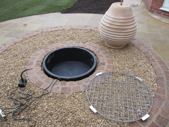 install a garden water feature grid