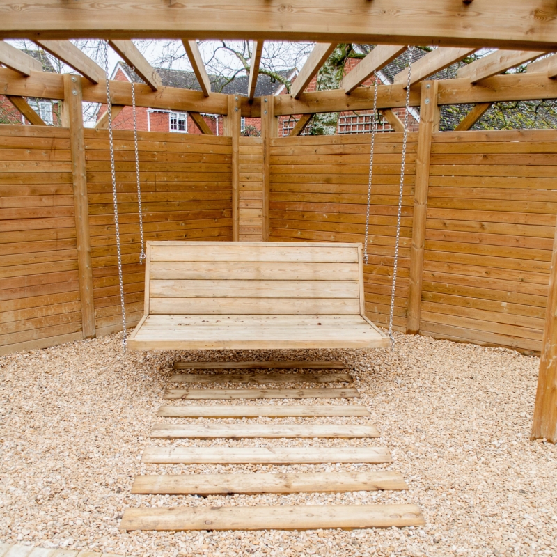 Sleeper Steps leading to pergola swing