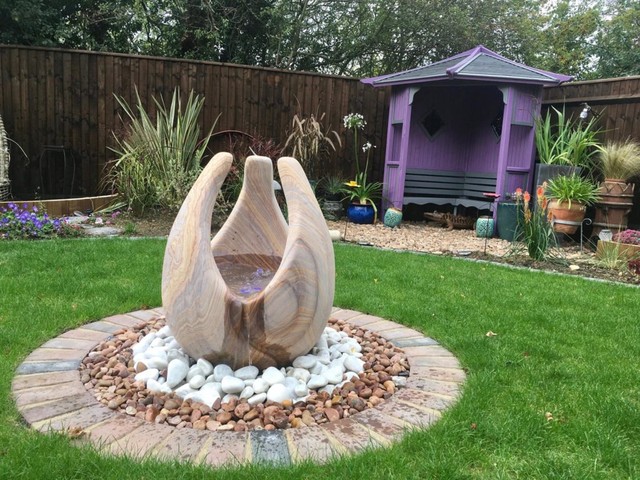 purple gazebo and water feature